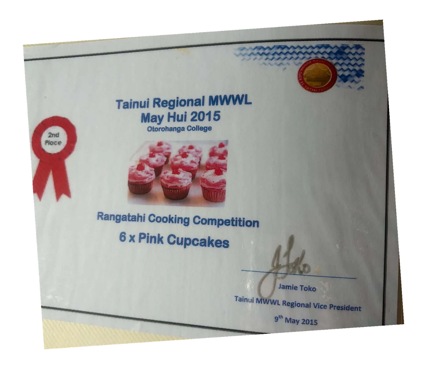 Certificate: Tainui Regional MWWL, May Hui 2015, Rangatahi Cooking Competition, 6 pink cupcakes, with a photo of the cupcakes and a 2nd place ribbon.